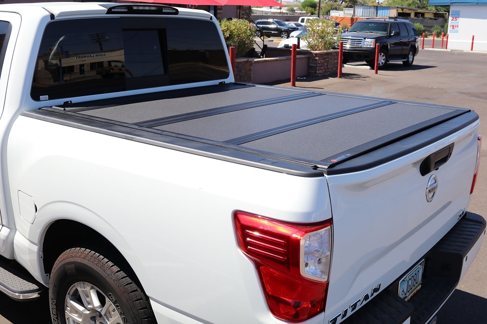 nissan titan hard trifold truck bed cover